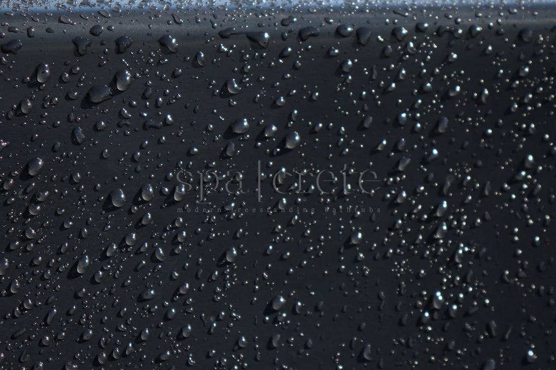 
                      SpaCrete interior with water beading on the sealed surface
                     